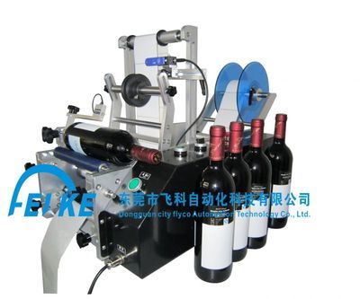 半自动红酒贴标机 高效酒瓶商标贴附解决方案与10天免费试机服务